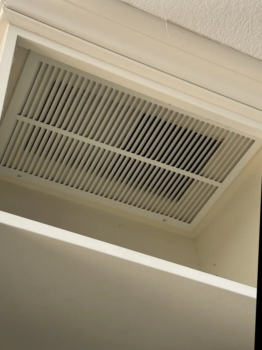 The same air-return vent clean, after
